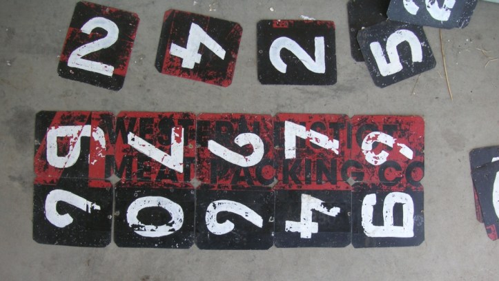 Home-made numbers and old advertising . And the red, black and white of the Birregurra Saints.