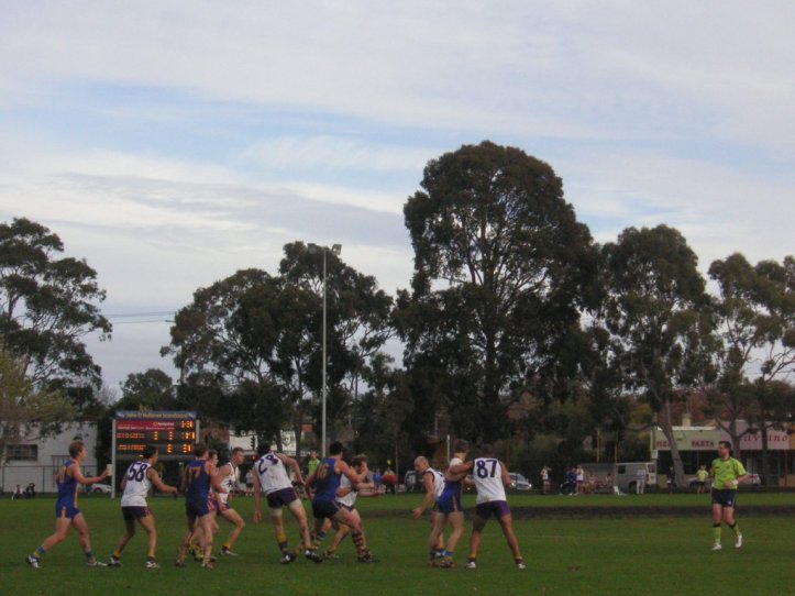  De La Salle (gold and blue), Collegians (white and purple) and a scoreboard that didn't take too kindly to my little camera. 