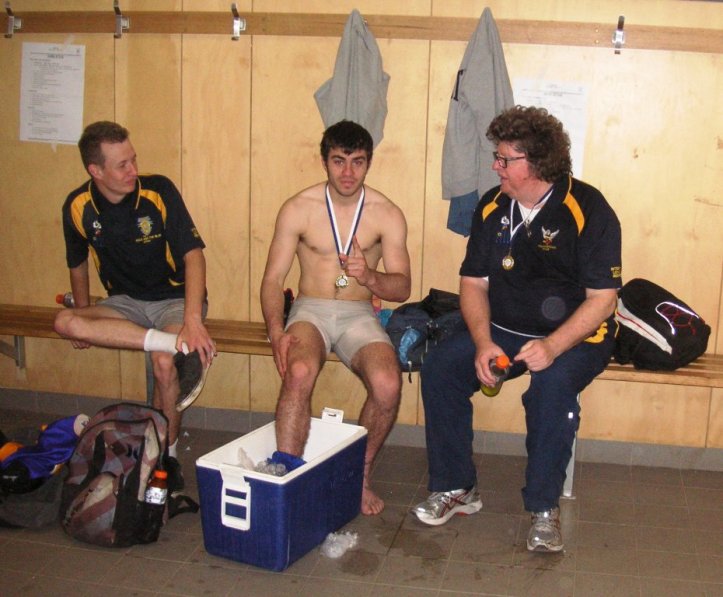 Williamstown premiership players Andrew Villiers and Kelvin O'Connor, with premiership coach Rob Klemm.